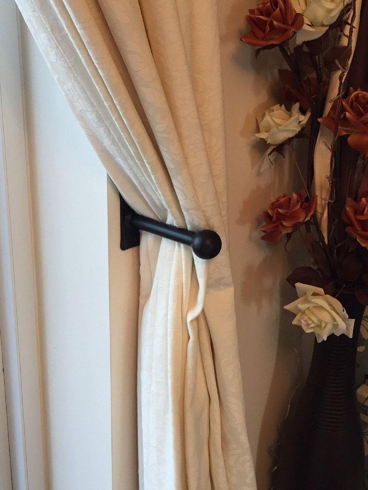  A Pair of Hand Forged Wrought Iron Metal Hold Backs with Ball Ends